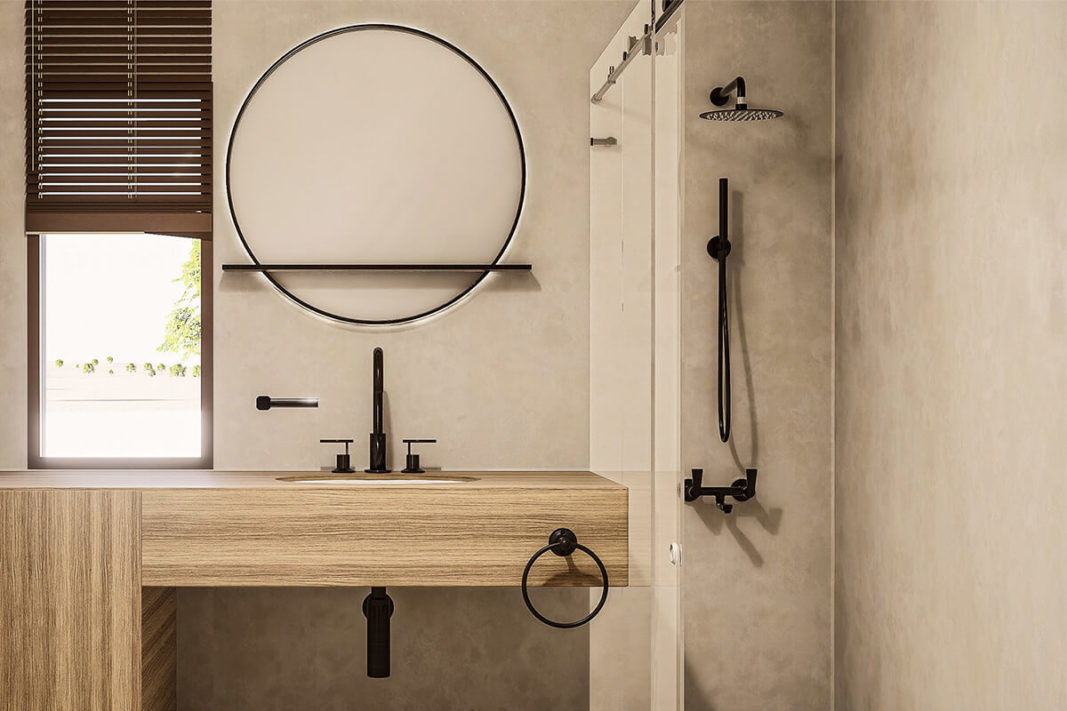 Moderna, cálida y con sabor a Mediterráneo. Así es Casa la Loma 8 Imagen renderizada de uno de los cuartos de baño del modelo de casa moderna de IDENOK